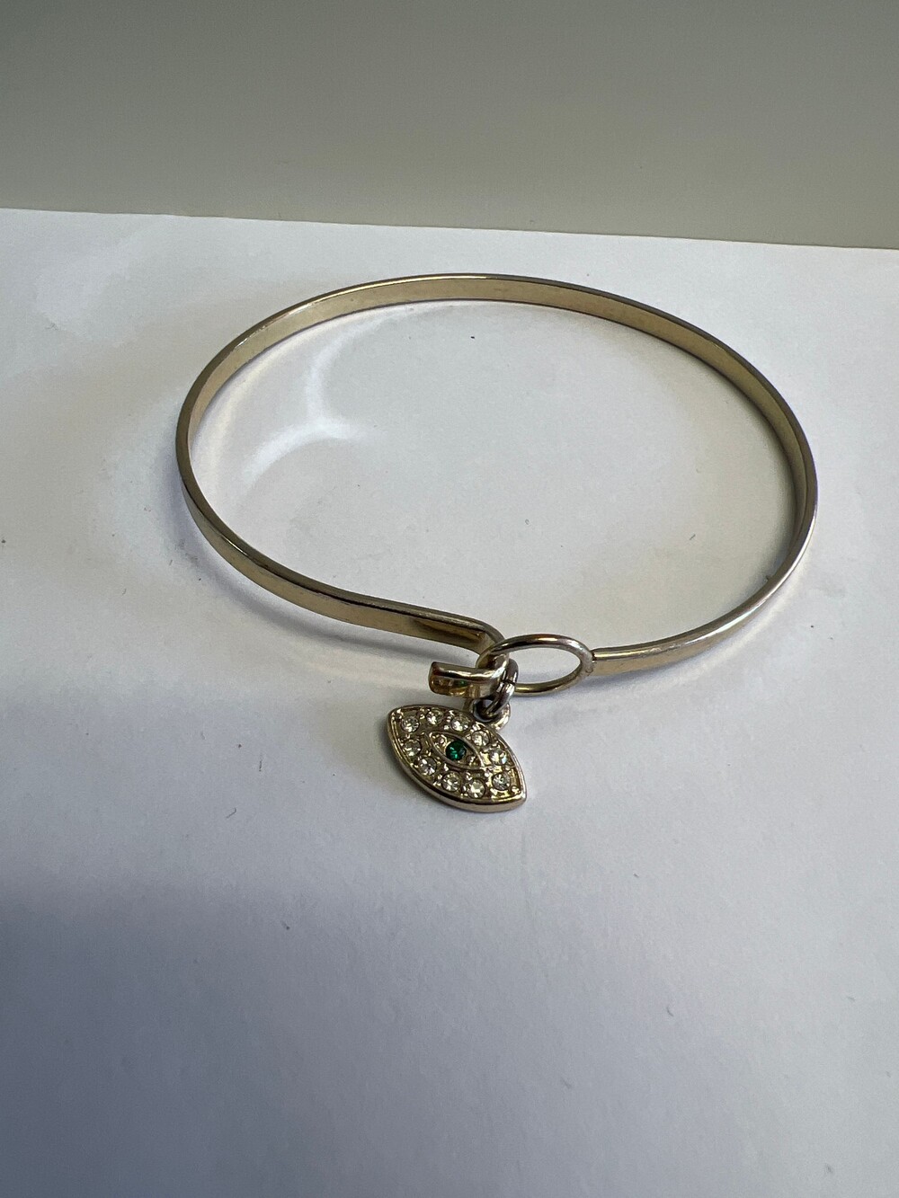 Silver-Tone Bangle Bracelet with Evil Eye Charm and Rhinestones